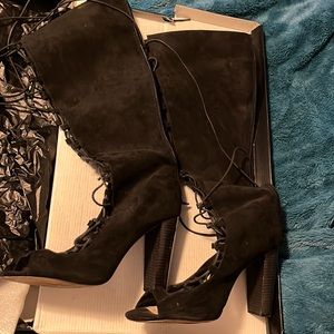 Lace up knee high boots